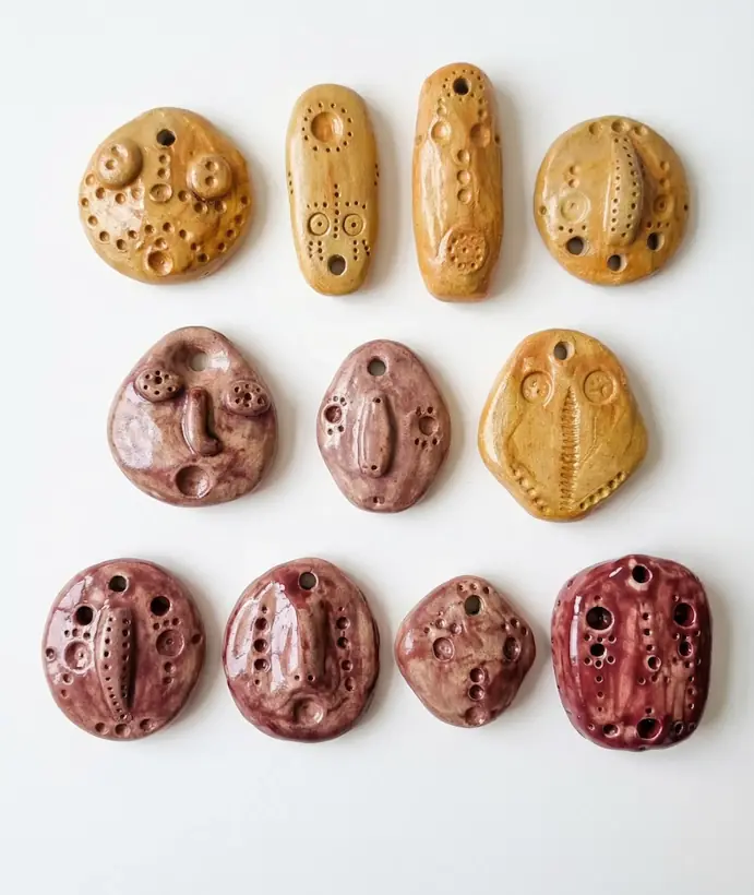 Feelings by Elena Danescu, glazed ceramic pendants